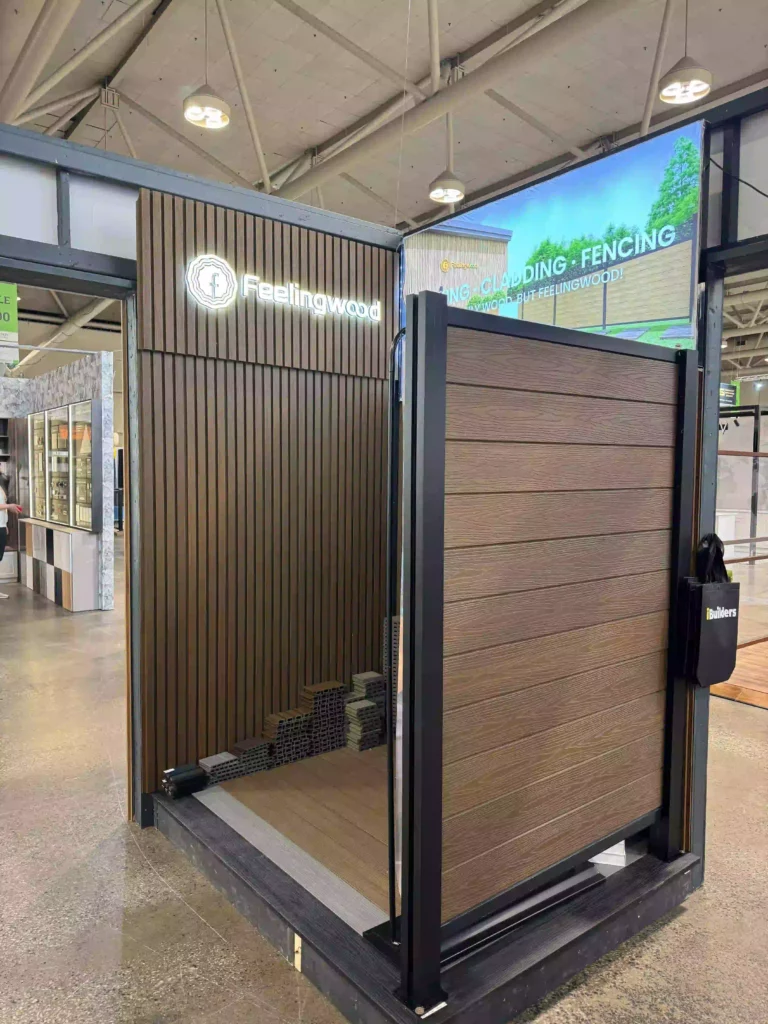 FeelingWood WPC cladding and fencing system displayed at an exhibition booth