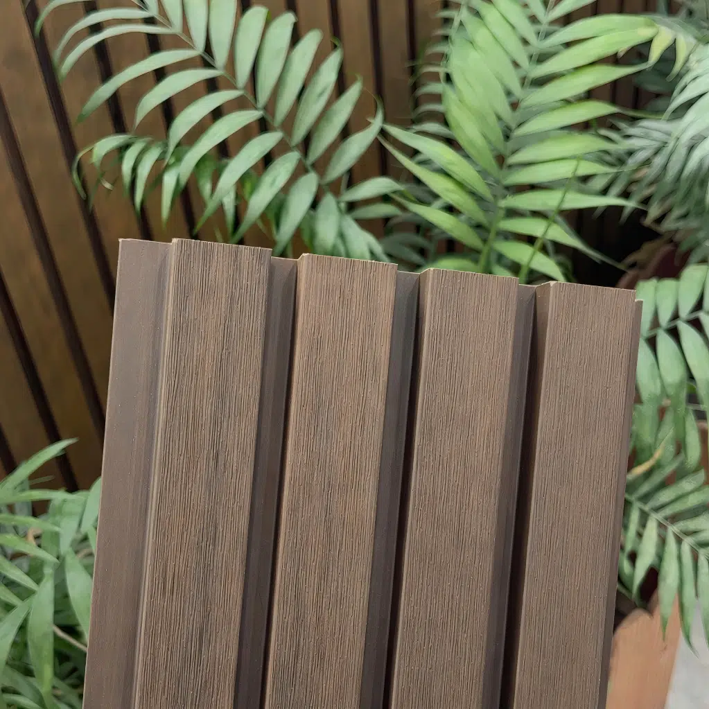 Feelingwood WPC cladding product detail image, showcasing natural wood grain texture and vertical panel structure, a composite exterior cladding material suitable for residential wall decoration