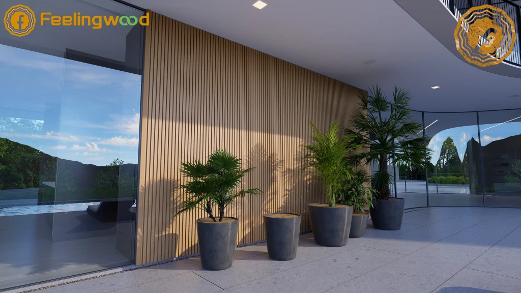Feelingwood WPC cladding with vertical groove design in a modern lobby entrance, paired with glass walls and indoor plants.