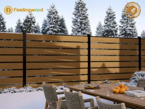Durable semi-private composite fencing from Feelingwood, designed for snowy cold climates, enclosing an outdoor dining area with modern aesthetic and weather resistance.