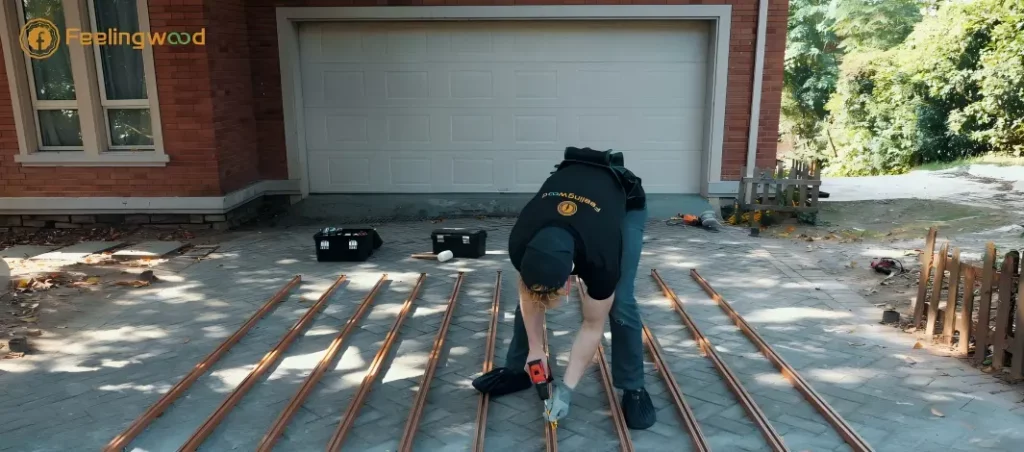 Contractor checking WPC decking joist layout using measuring tools, ensuring proper alignment and spacing before installation in Canadian backyard